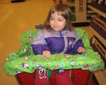 Sophie in her cart-covered seat